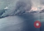 Standbild Gun camera footage strafing Ziele Tarumizu Kyushu in Japan, 1945, aus Sekunde 11 historischem Filmmaterial Videoclip 65675023197