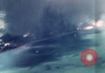 Standbild Gun camera footage strafing Ziele Tarumizu Kyushu in Japan, 1945, aus Sekunde 13 historischem Filmmaterial Videoclip 65675023197