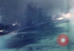 Standbild Gun camera footage strafing Ziele Tarumizu Kyushu in Japan, 1945, aus Sekunde 14 historischem Filmmaterial Videoclip 65675023197