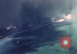 Standbild Gun camera footage strafing Ziele Tarumizu Kyushu in Japan, 1945, aus Sekunde 16 historischem Filmmaterial Videoclip 65675023197