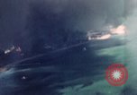 Standbild Gun camera footage strafing Ziele Tarumizu Kyushu in Japan, 1945, aus Sekunde 17 historischem Filmmaterial Videoclip 65675023197