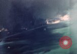 Standbild Gun camera footage strafing Ziele Tarumizu Kyushu in Japan, 1945, aus Sekunde 18 historischem Filmmaterial Videoclip 65675023197