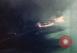 Standbild Gun camera footage strafing Ziele Tarumizu Kyushu in Japan, 1945, aus Sekunde 21 historischem Filmmaterial Videoclip 65675023197