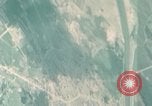 Standbild Gun camera footage strafing Ziele Tarumizu Kyushu in Japan, 1945, aus Sekunde 39 historischem Filmmaterial Videoclip 65675023197