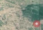 Standbild Gun camera footage strafing Ziele Tarumizu Kyushu in Japan, 1945, aus Sekunde 43 historischem Filmmaterial Videoclip 65675023197