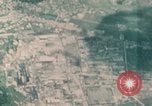 Standbild Gun camera footage strafing Ziele Tarumizu Kyushu in Japan, 1945, aus Sekunde 44 historischem Filmmaterial Videoclip 65675023197