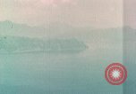 Standbild Gun camera footage strafing Ziele Tarumizu Kyushu in Japan, 1945, aus Sekunde 49 historischem Filmmaterial Videoclip 65675023197