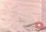 Standbild Gun camera footage strafing Ziele Tarumizu Kyushu in Japan, 1945, aus Sekunde 50 historischem Filmmaterial Videoclip 65675023197