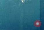 Standbild Gun camera footage strafing Ziele Tarumizu Kyushu in Japan, 1945, aus Sekunde 58 historischem Filmmaterial Videoclip 65675023197