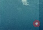 Standbild Gun camera footage strafing Ziele Tarumizu Kyushu in Japan, 1945, aus Sekunde 59 historischem Filmmaterial Videoclip 65675023197