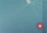 Standbild Gun camera footage strafing Ziele Tarumizu Kyushu in Japan, 1945, aus Sekunde 61 historischem Filmmaterial Videoclip 65675023197