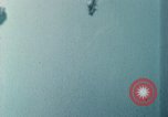 Standbild US Army Air Force Brände auf Schiffen Tarumizu Kyushu in Japan, 1945, aus Sekunde 8 historischem Filmmaterial Videoclip 65675023199