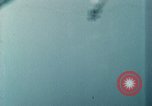 Standbild US Army Air Force Brände auf Schiffen Tarumizu Kyushu in Japan, 1945, aus Sekunde 9 historischem Filmmaterial Videoclip 65675023199
