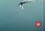 Standbild US Army Air Force Brände auf Schiffen Tarumizu Kyushu in Japan, 1945, aus Sekunde 11 historischem Filmmaterial Videoclip 65675023199