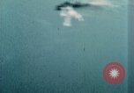 Standbild US Army Air Force Brände auf Schiffen Tarumizu Kyushu in Japan, 1945, aus Sekunde 12 historischem Filmmaterial Videoclip 65675023199