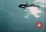 Standbild US Army Air Force Brände auf Schiffen Tarumizu Kyushu in Japan, 1945, aus Sekunde 15 historischem Filmmaterial Videoclip 65675023199