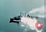 Standbild US Army Air Force Brände auf Schiffen Tarumizu Kyushu in Japan, 1945, aus Sekunde 16 historischem Filmmaterial Videoclip 65675023199