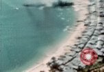Standbild US Army Air Force Brände auf Schiffen Tarumizu Kyushu in Japan, 1945, aus Sekunde 17 historischem Filmmaterial Videoclip 65675023199