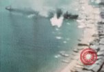 Standbild US Army Air Force Brände auf Schiffen Tarumizu Kyushu in Japan, 1945, aus Sekunde 19 historischem Filmmaterial Videoclip 65675023199