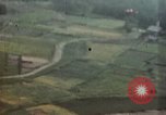 Standbild USAAF Brände auf dem Boden Ziele Japan Miyakonojo, 1945, aus Sekunde 25 historischem Filmmaterial Videoclip 65675023203