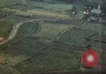 Standbild USAAF Brände auf dem Boden Ziele Japan Miyakonojo, 1945, aus Sekunde 26 historischem Filmmaterial Videoclip 65675023203