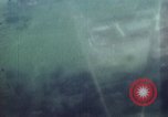 Image of US Aircraft strafe Japanese targets Kyushu Japan, 1945, second 27 stock footage video 65675023206