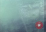 Image of US Aircraft strafe Japanese targets Kyushu Japan, 1945, second 28 stock footage video 65675023206