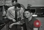 Image of Astronaut undergoes test Ohio United States USA, 1959, second 56 stock footage video 65675023386