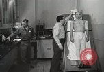 Immagine di Test della NASA Hal Crandall per fitness Ohio United States USA, 1959, secondo 43 filmato di repertorio 65675023415