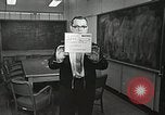 Image of Mercury Evaluation board representatives Ohio United States USA, 1959, second 3 stock footage video 65675023430