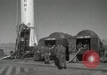 Image of Redstone Missile being fueled from trucks New Mexico United States USA, 1960, second 15 stock footage video 65675023466