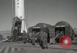 Image of Redstone Missile being fueled from trucks New Mexico United States USA, 1960, second 16 stock footage video 65675023466