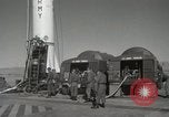 Image of Redstone Missile being fueled from trucks New Mexico United States USA, 1960, second 17 stock footage video 65675023466