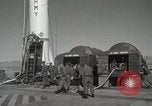 Image of Redstone Missile being fueled from trucks New Mexico United States USA, 1960, second 19 stock footage video 65675023466