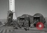 Image of Redstone Missile being fueled from trucks New Mexico United States USA, 1960, second 20 stock footage video 65675023466