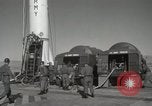 Image of Redstone Missile being fueled from trucks New Mexico United States USA, 1960, second 21 stock footage video 65675023466