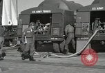 Image of Redstone Missile being fueled from trucks New Mexico United States USA, 1960, second 24 stock footage video 65675023466