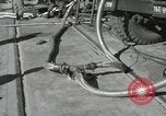 Image of Redstone Missile being fueled from trucks New Mexico United States USA, 1960, second 40 stock footage video 65675023466