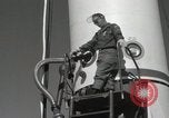 Image of Redstone Missile being fueled from trucks New Mexico United States USA, 1960, second 43 stock footage video 65675023466