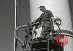 Image of Redstone Missile being fueled from trucks New Mexico United States USA, 1960, second 45 stock footage video 65675023466