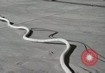 Image of Fueling a Redstone Missile at White Sands New Mexico United States USA, 1960, second 30 stock footage video 65675023467