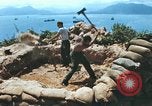 Immagine di Faro francese tower e navi in Cam Ranh Bay Vietnam Cam Ranh Bay Vietnam, 1967, secondo 1 filmato di repertorio 65675023521