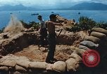 Immagine di Faro francese tower e navi in Cam Ranh Bay Vietnam Cam Ranh Bay Vietnam, 1967, secondo 5 filmato di repertorio 65675023521