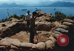 Immagine di Faro francese tower e navi in Cam Ranh Bay Vietnam Cam Ranh Bay Vietnam, 1967, secondo 6 filmato di repertorio 65675023521