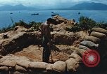 Immagine di Faro francese tower e navi in Cam Ranh Bay Vietnam Cam Ranh Bay Vietnam, 1967, secondo 7 filmato di repertorio 65675023521