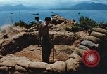 Immagine di Faro francese tower e navi in Cam Ranh Bay Vietnam Cam Ranh Bay Vietnam, 1967, secondo 9 filmato di repertorio 65675023521