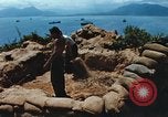 Immagine di Faro francese tower e navi in Cam Ranh Bay Vietnam Cam Ranh Bay Vietnam, 1967, secondo 11 filmato di repertorio 65675023521