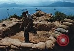 Immagine di Faro francese tower e navi in Cam Ranh Bay Vietnam Cam Ranh Bay Vietnam, 1967, secondo 12 filmato di repertorio 65675023521