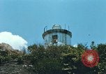 Immagine di Faro francese tower e navi in Cam Ranh Bay Vietnam Cam Ranh Bay Vietnam, 1967, secondo 14 filmato di repertorio 65675023521