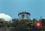 Immagine di Faro francese tower e navi in Cam Ranh Bay Vietnam Cam Ranh Bay Vietnam, 1967, secondo 16 filmato di repertorio 65675023521